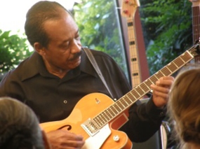 Man teaching guitar