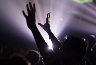 Silhouette of man in worship